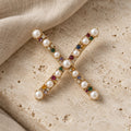 Broche Cruce - portada